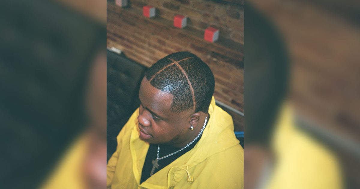 Introducing the Middle Part Fade: A Bold New Look at Artisan Barber